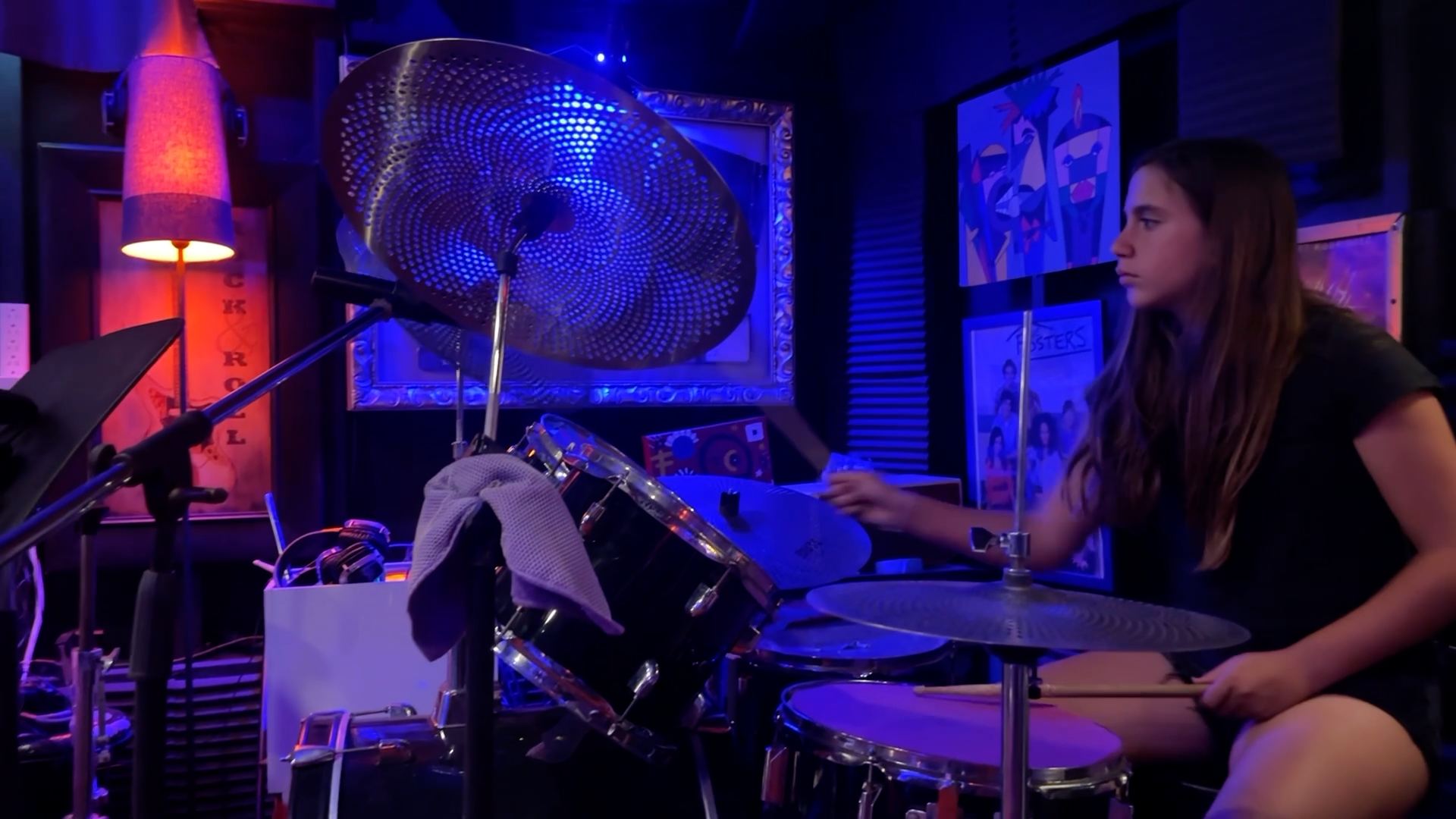 A student playing drums
